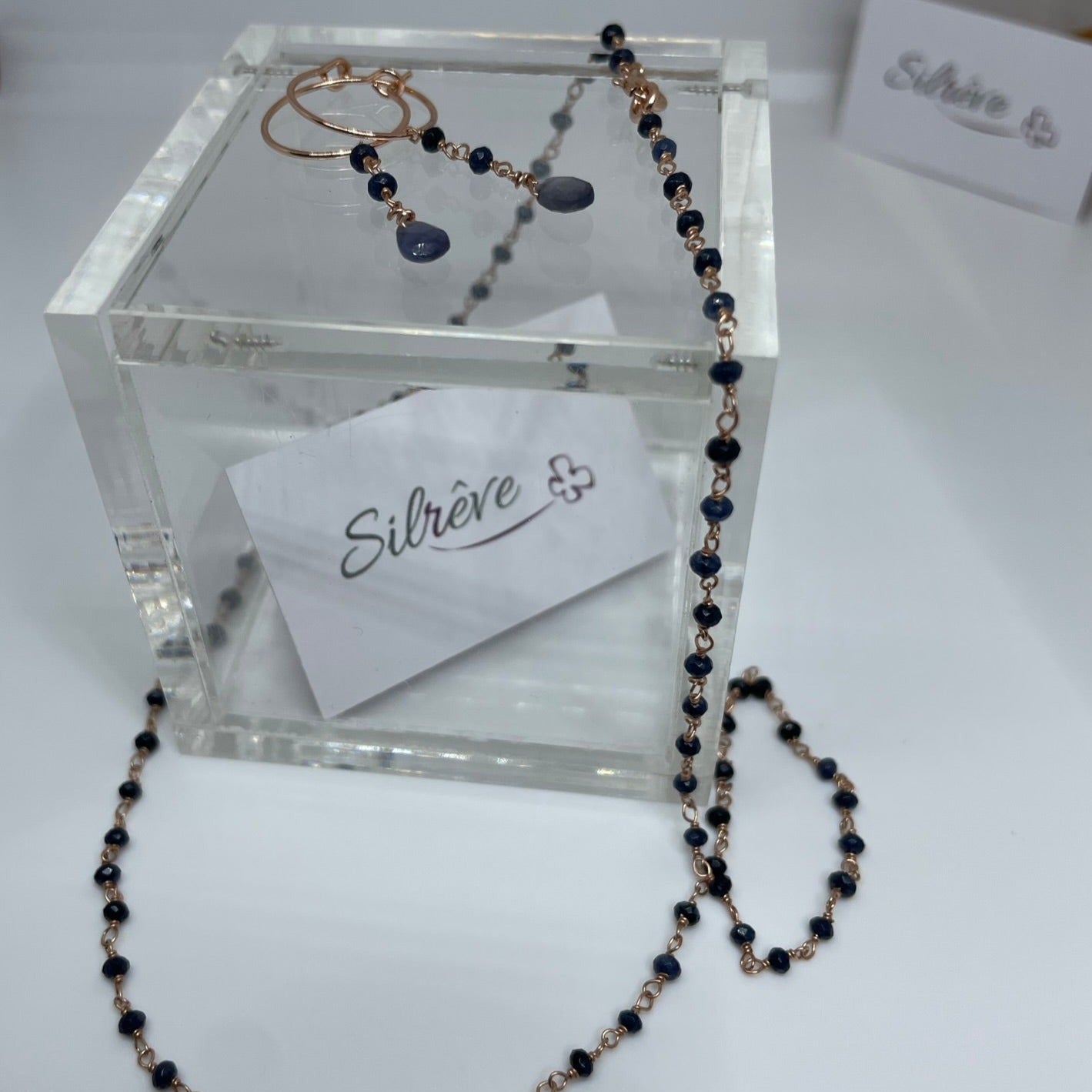 Parure girocollo e/o orecchini e/o braccialetto in Ag. 925, con pietre preziose