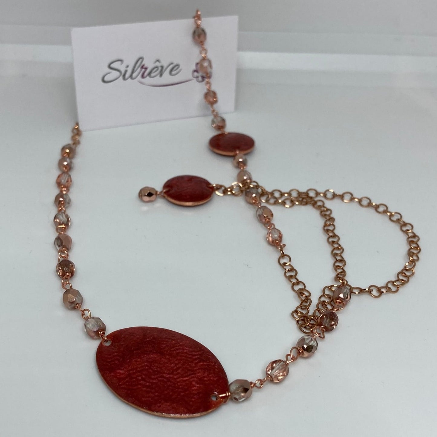 Collana in rame con inserti tondo e ovale dipinti e vetrificati a mano, impreziosita con cristalli