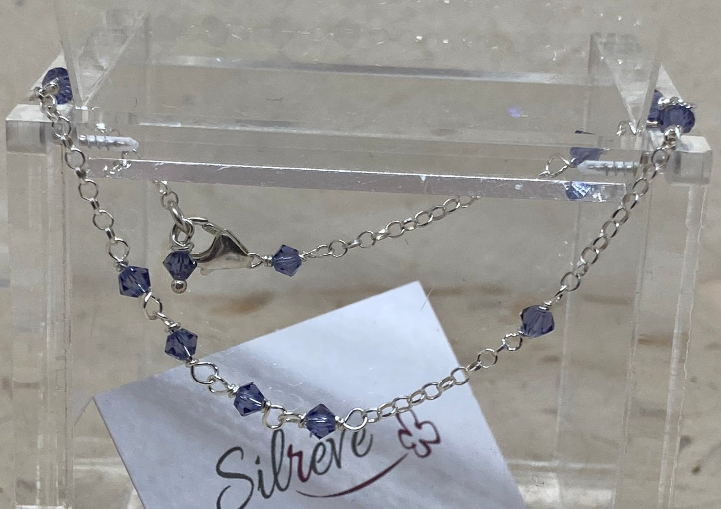Braccialetto rolò in Ag. 925, impreziosito con piccoli cristalli colorati