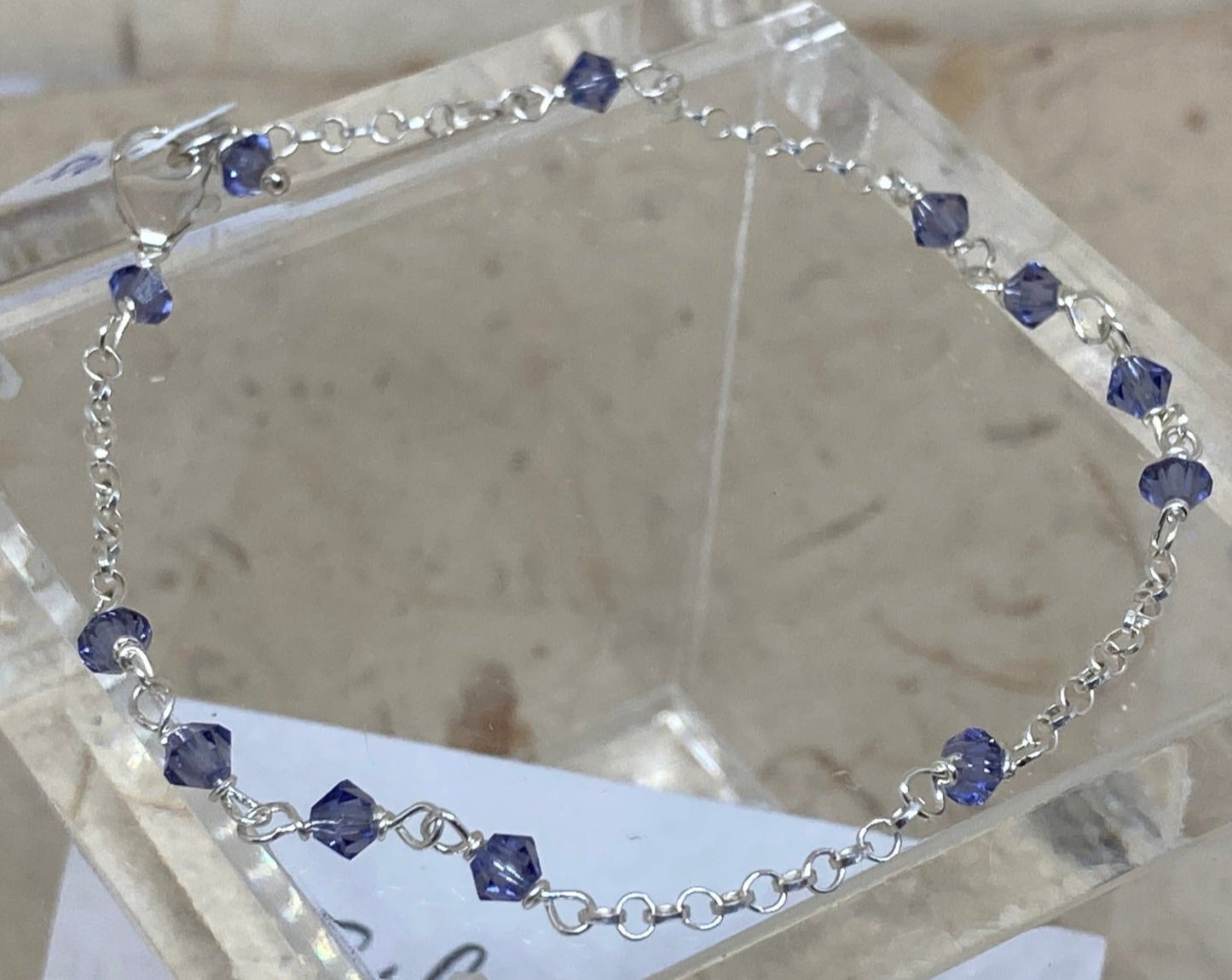 Braccialetto rolò in Ag. 925, impreziosito con piccoli cristalli colorati